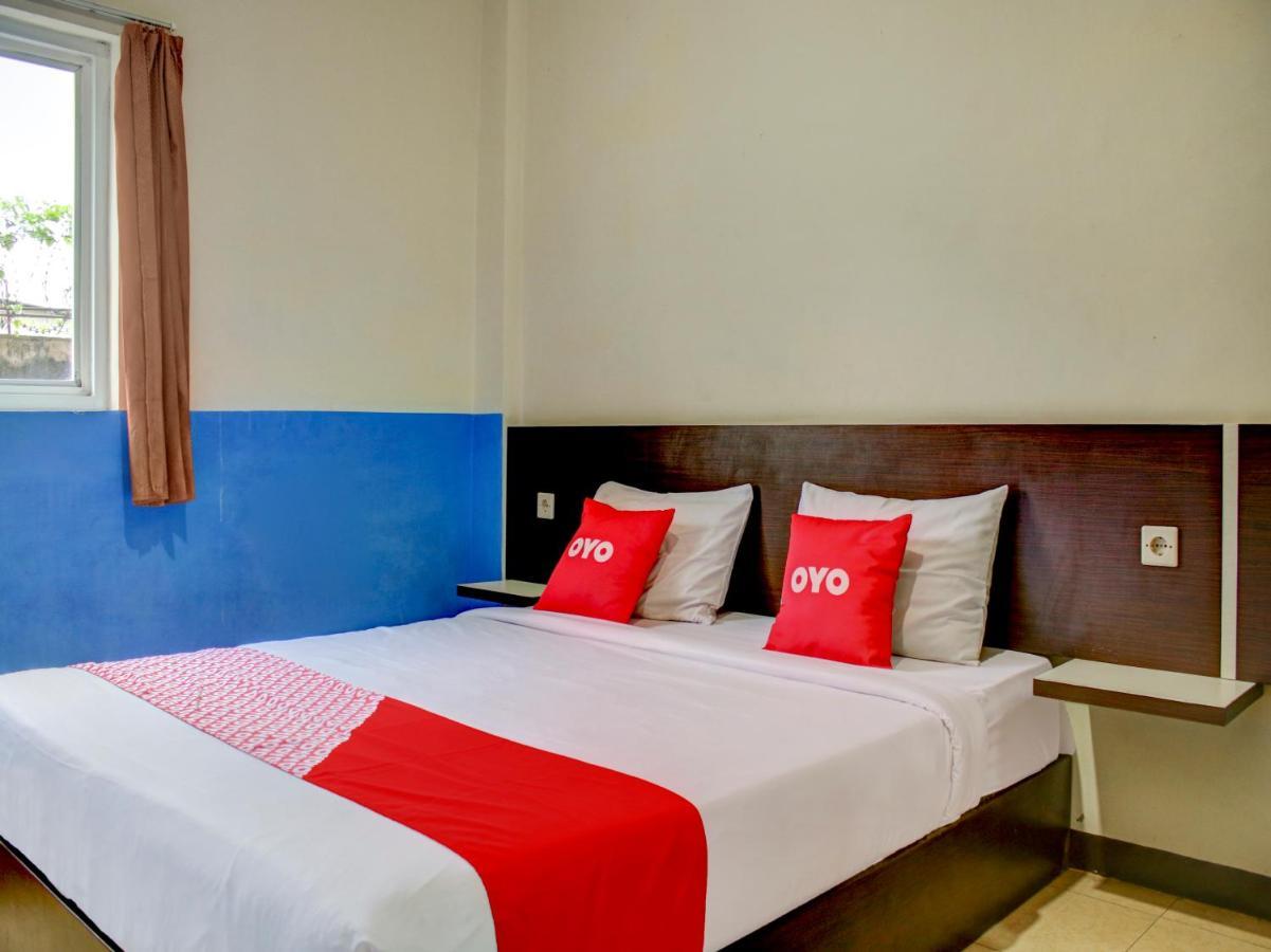 Oyo 90162 Remboelan Guest House Sungai Lutus Kültér fotó