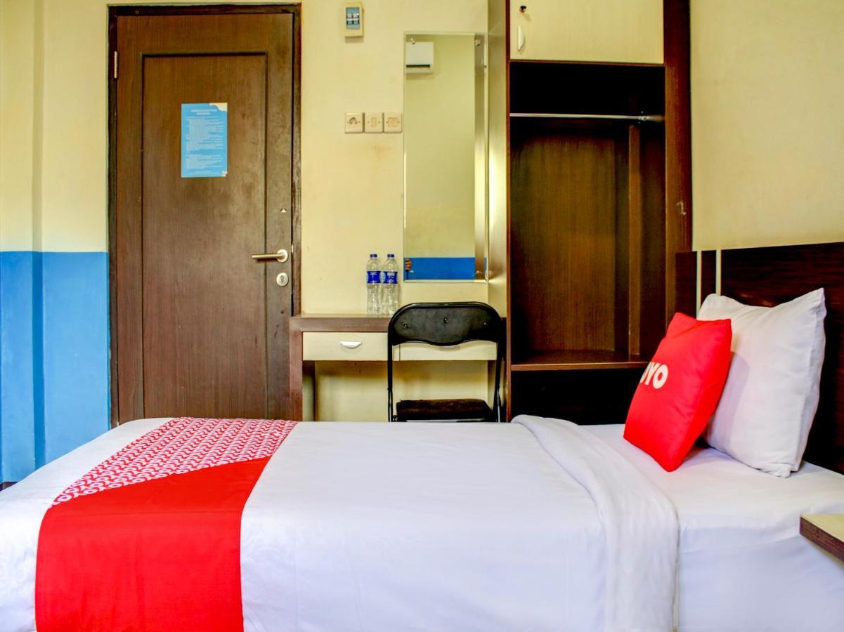 Oyo 90162 Remboelan Guest House Sungai Lutus Kültér fotó