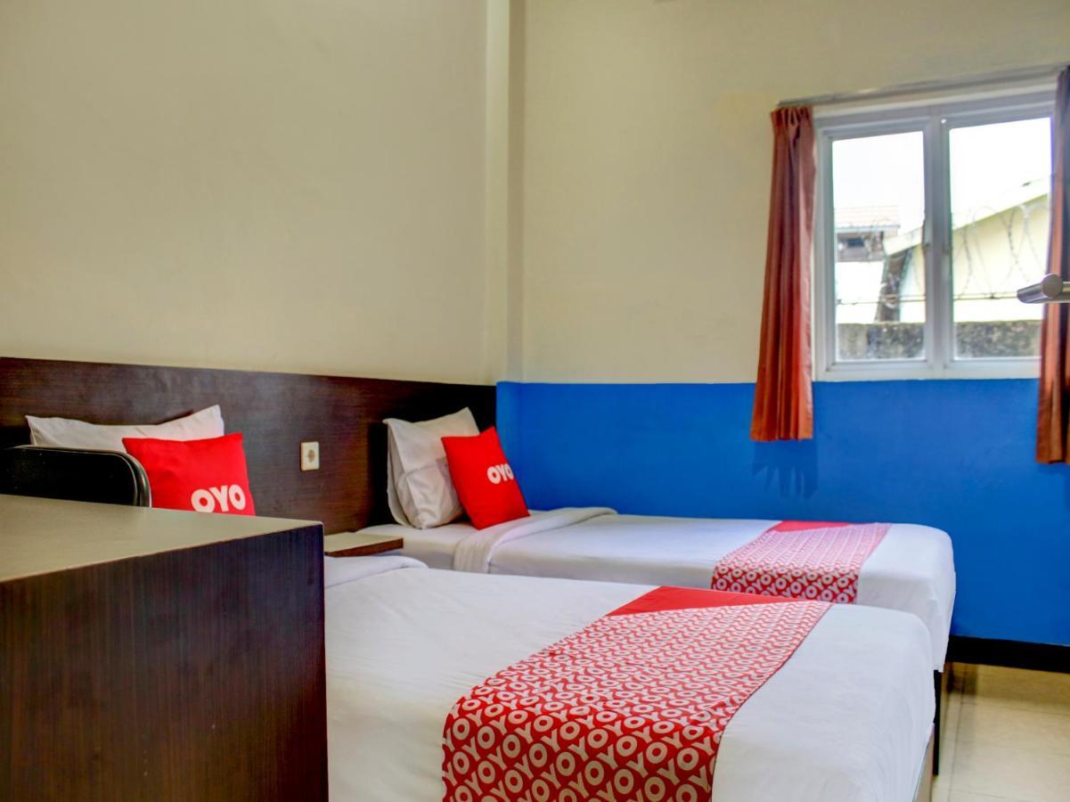 Oyo 90162 Remboelan Guest House Sungai Lutus Kültér fotó