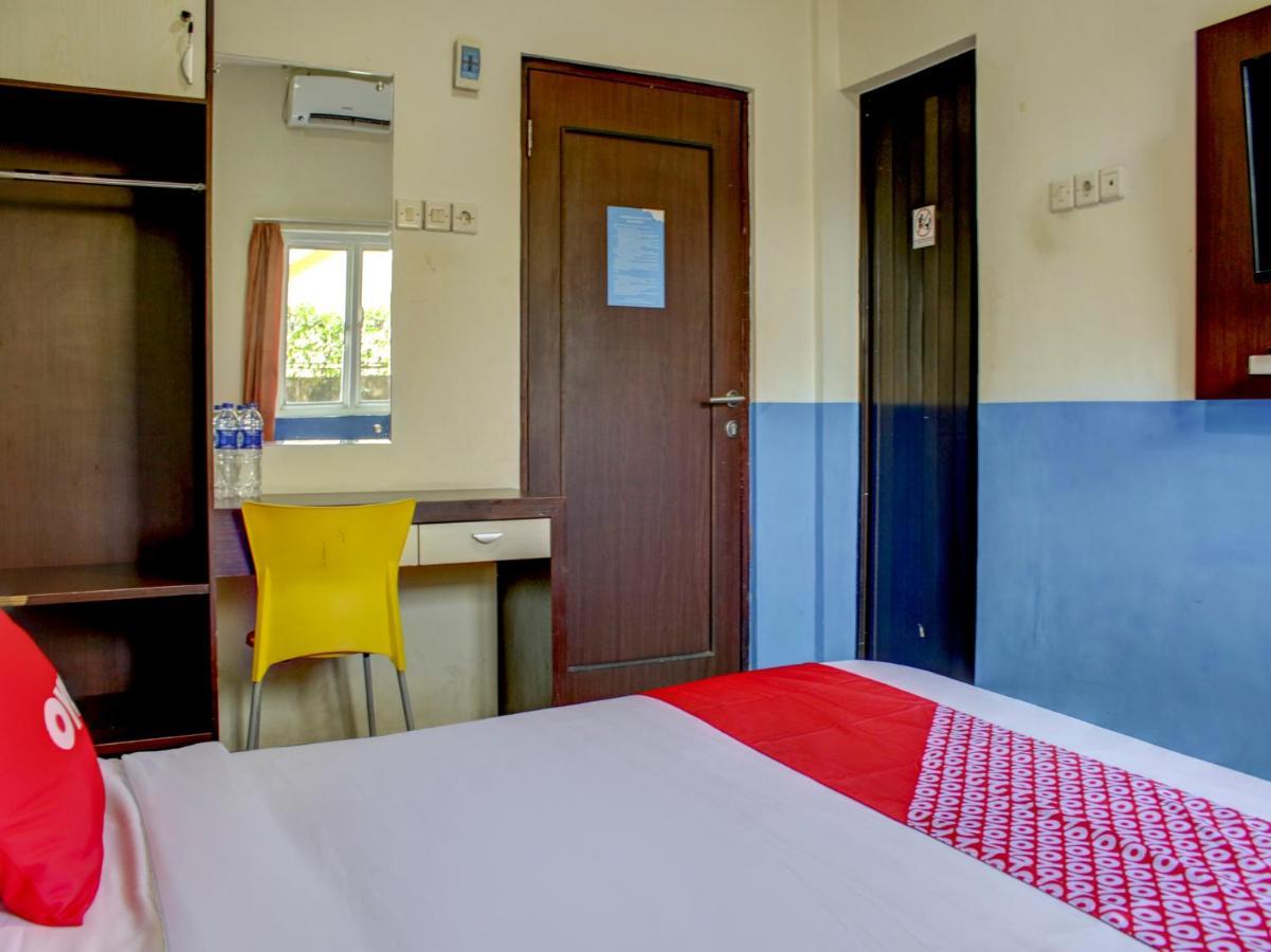 Oyo 90162 Remboelan Guest House Sungai Lutus Kültér fotó