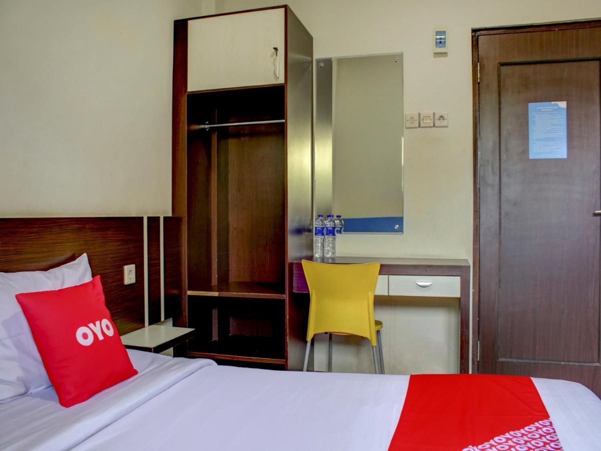 Oyo 90162 Remboelan Guest House Sungai Lutus Kültér fotó