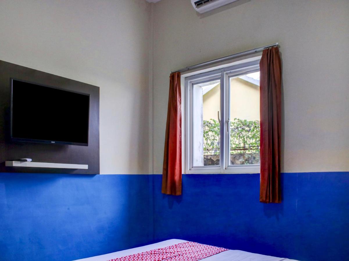 Oyo 90162 Remboelan Guest House Sungai Lutus Kültér fotó