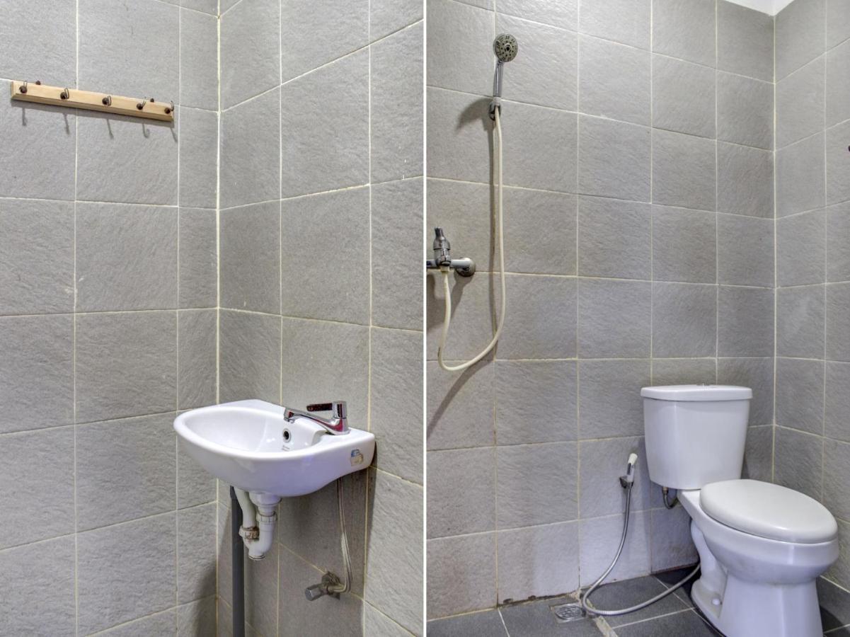Oyo 90162 Remboelan Guest House Sungai Lutus Kültér fotó